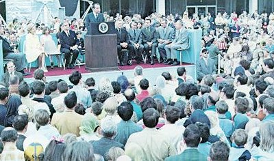 A photo of President Nixon giving a speech