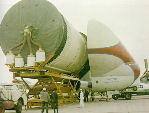A photo of a S-IVB stage being unloaded onto a cargo trailer