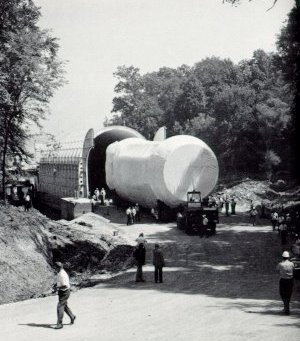 A photo of Saturn I being backed into its barge