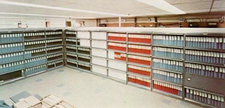 A photo of large volume of books on bookshelves