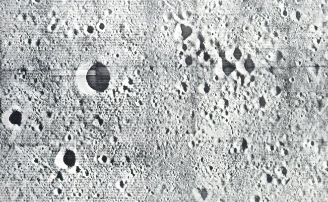 A photo of many craters on the Moon
