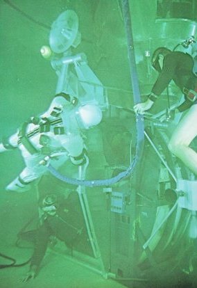 A photo of astronaut in a big water tank